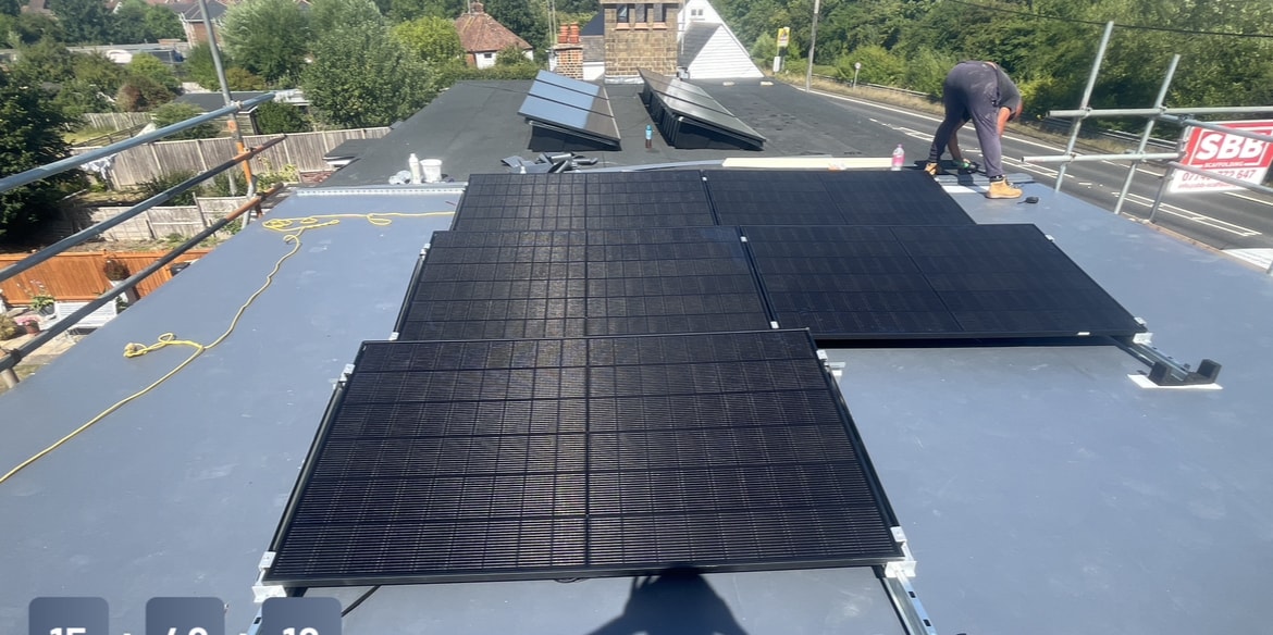 Solar panels installed on flat roof during installation