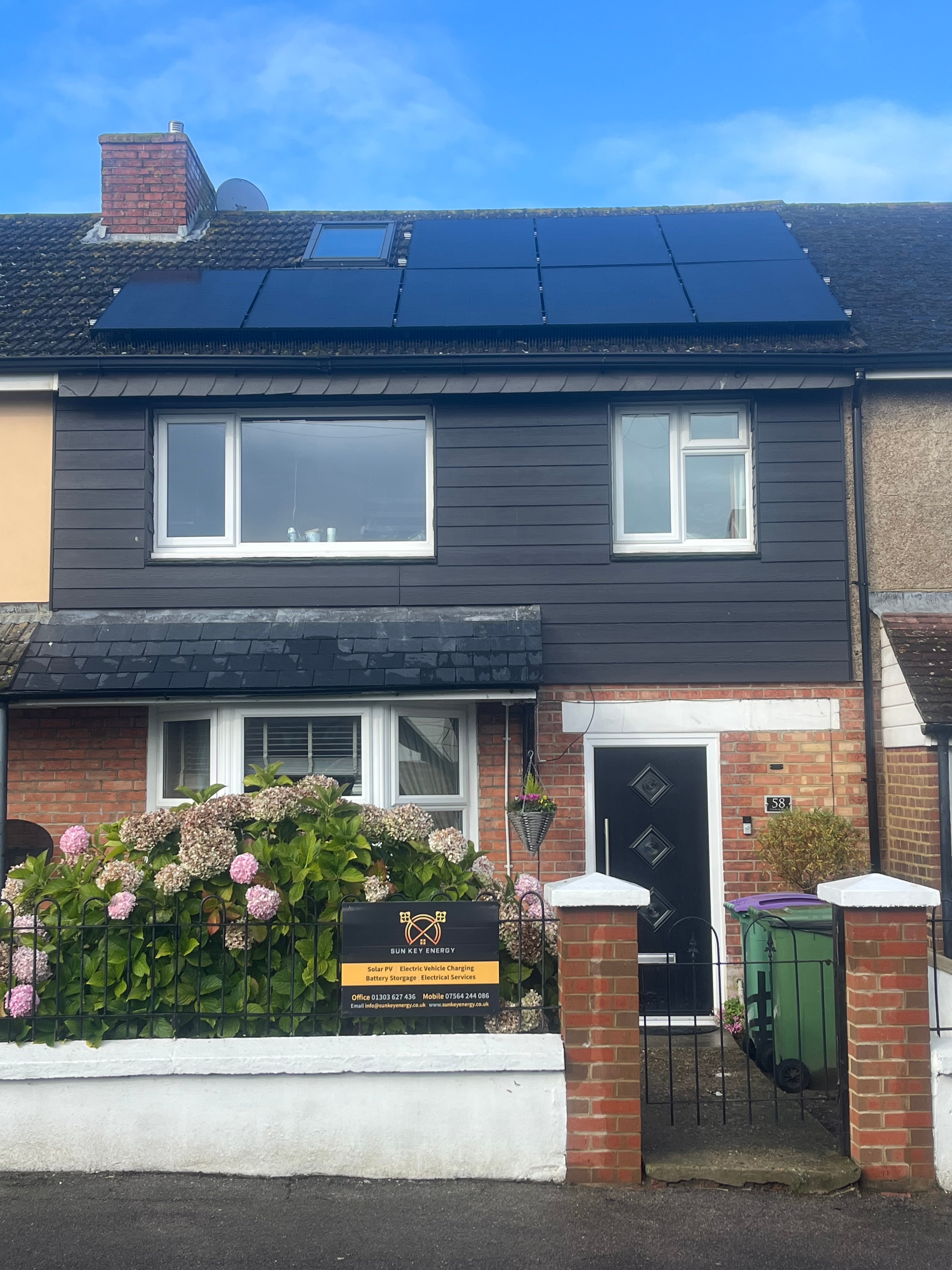 Completed solar installation on house front